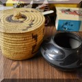 D04. Native American basket and pottery. 